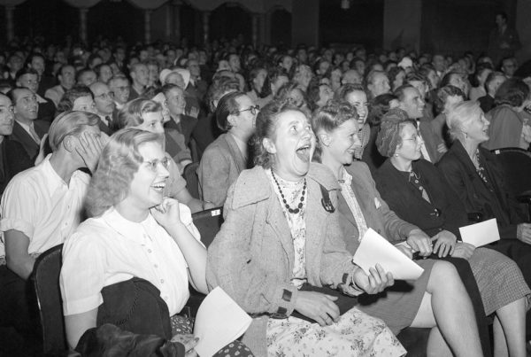 8/14/1946, Berlin, Germany- A row of women laugh heartily as they see Charlie Chaplin's imitation of Hitler making a speech in the movie "The Great Dictator." Image by © Bettmann/CORBIS