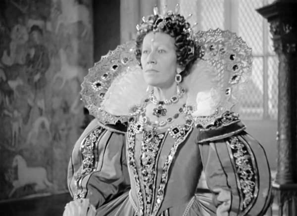 Fire Over England (1937) - Flora Robson - pale gown slashed