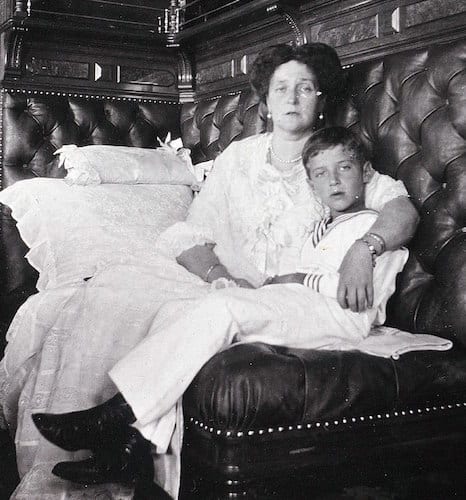 Tsarina Alexandra and Tsarevich Alexei in a stateroom aboard the Imperial Yacht Standart, c. 1911, Beinecke Library