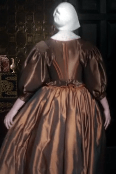 The Miniaturist (2018) Nella - brown gown